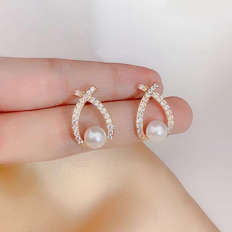 Brincos de pérola com glitter